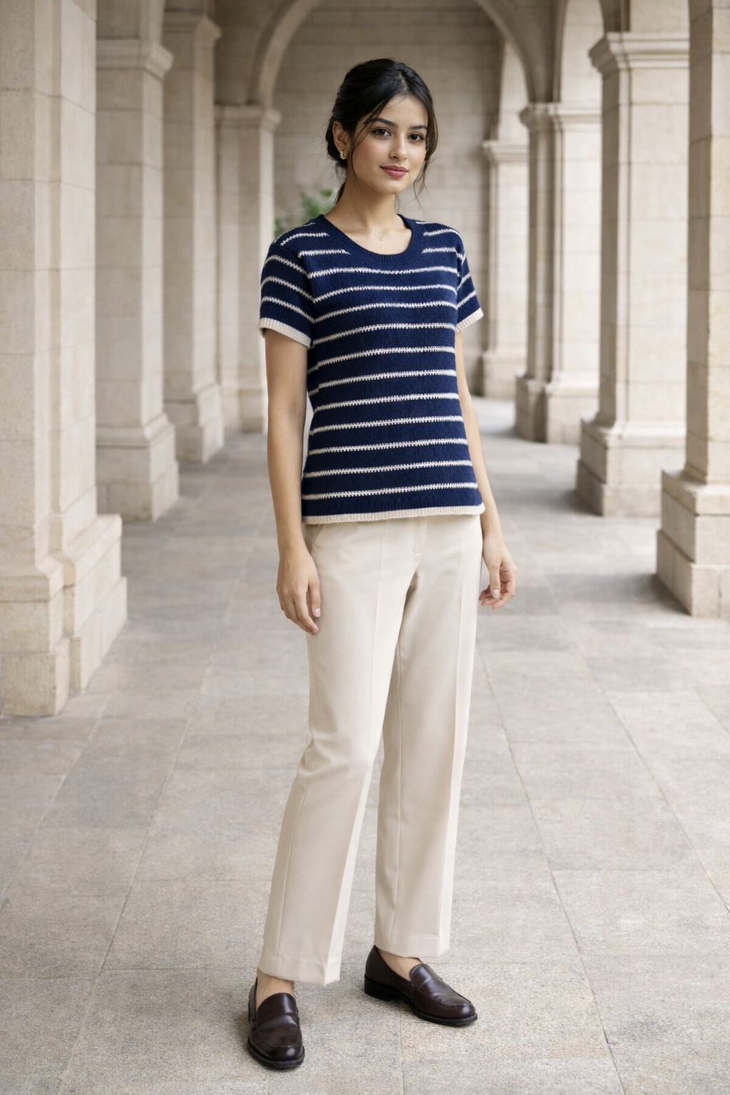 Women's oversized blue navy crew-neck top with white horizontal stripes, ribbed white trim on sleeve cuffs and hem