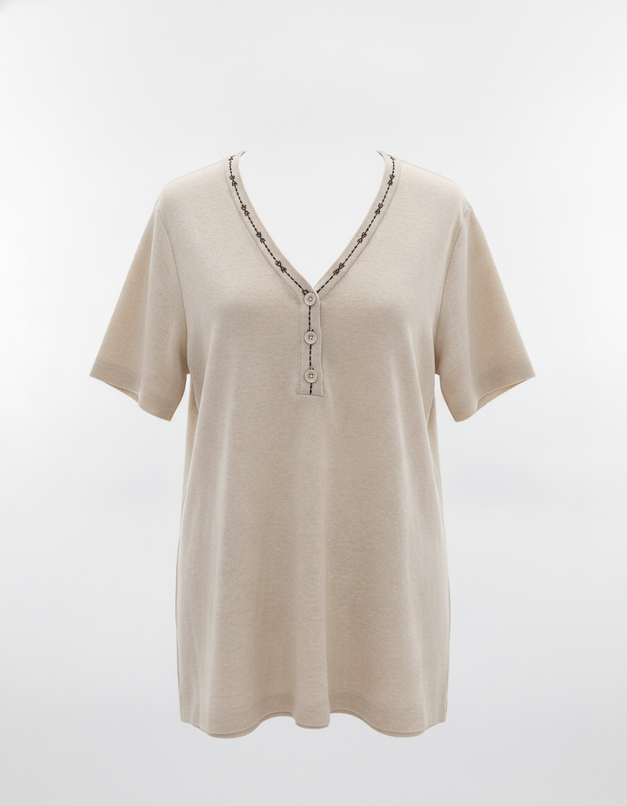 Beige women's top with V-neck and three buttons down front, black decorative stitch detail along neckline and placket
