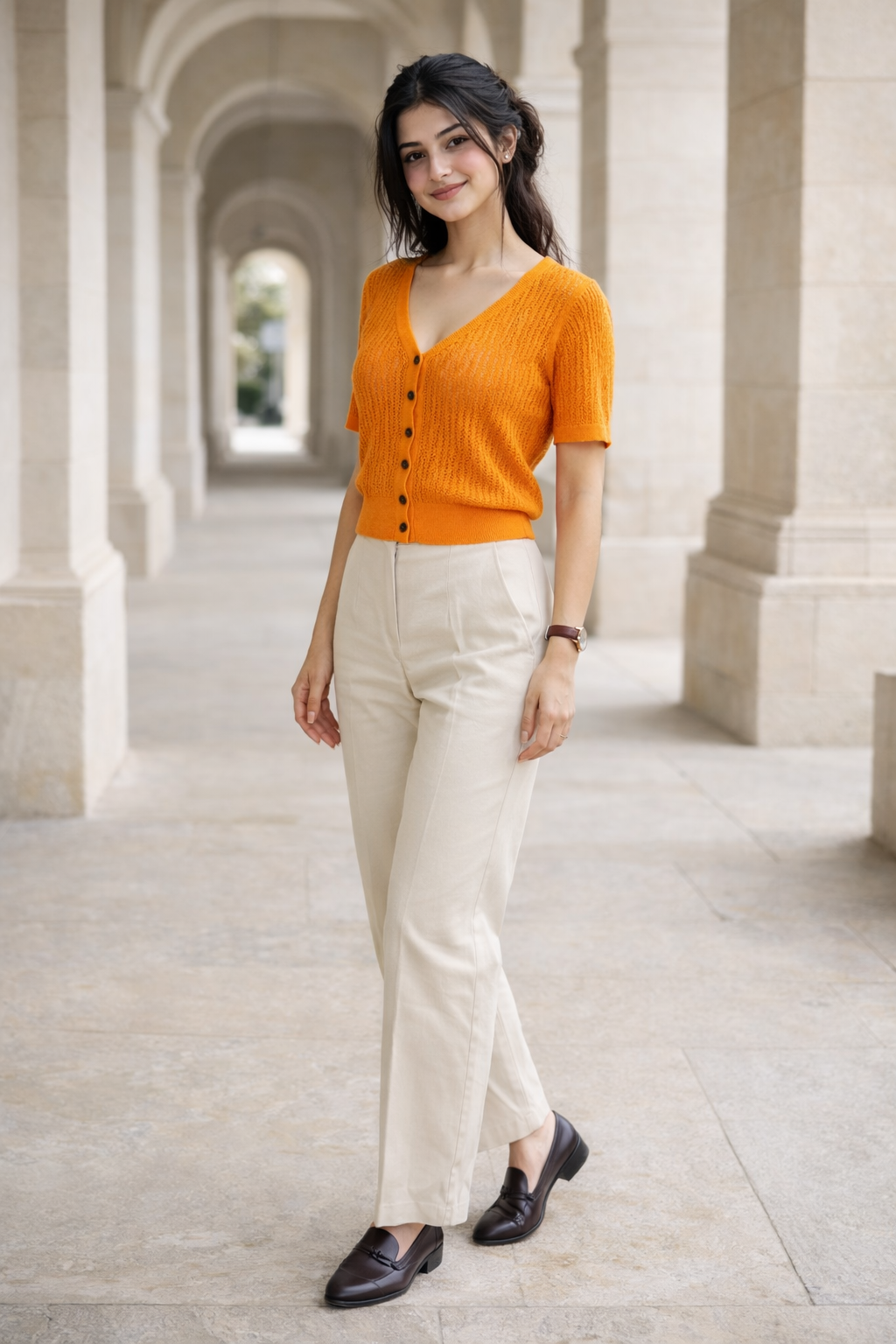 Orange women's knit top with V-neck, button front, short sleeves and oversized fit