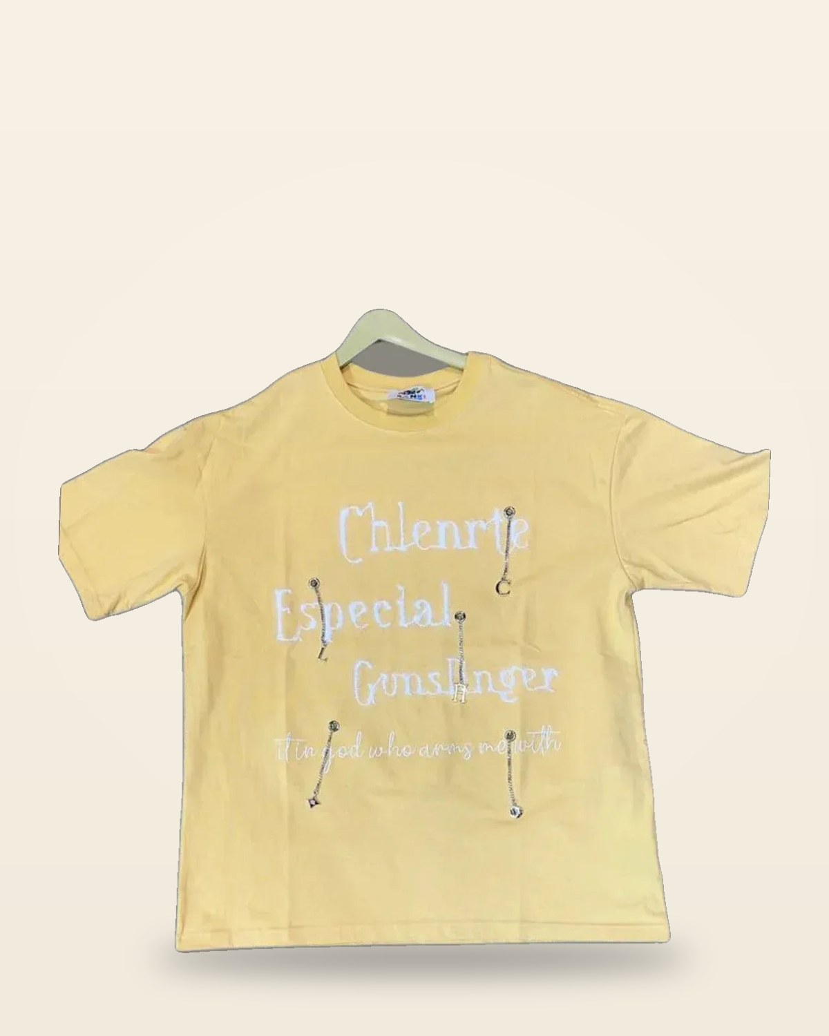 Pastel Yellow Graphic Tee — Distressed Print with Eyelet Details
